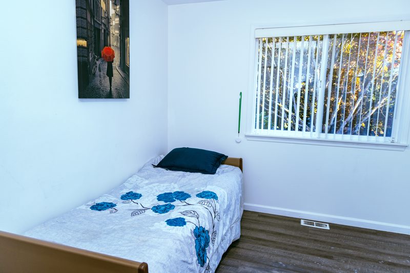Covered Main Entryway - Protected drop-off and entry area designed for safe resident mobility in all weather