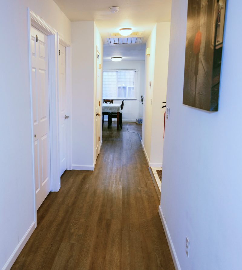 Kitchen Direct Sightlines - Open layout enabling 24/7 continuous visual supervision by awake caregivers