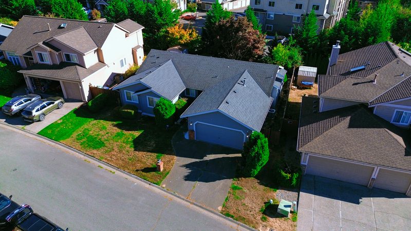 Backyard Recreation Patio & Lawn - Secure outdoor courtyard and garden paths for resident walks and fresh air